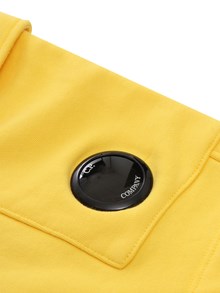CP COMPANY KIDS Yellow fleece shorts