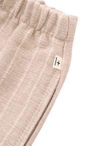 One More In The Family Beige pinstripe trousers
