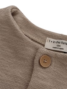 One More In The Family Brown jacket with ruffle