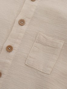 One More In The Family Beige shirt